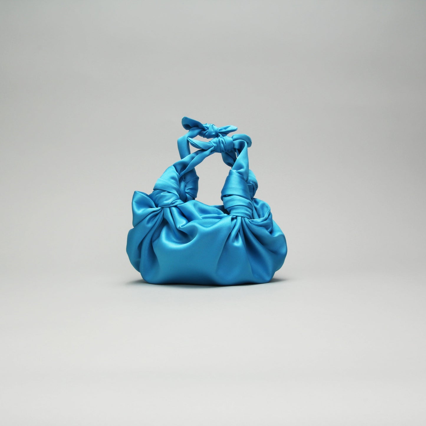 AQUA NLA SILK KNOT BAG